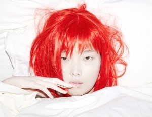 Sung Hee in bed at the Nomad by Robin Black for Beauty Is Boring.